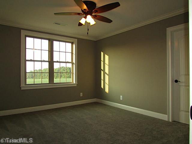 6303 Rylan Court Browns Summit, NC 27214 - Photo 8 of 14 3rd Bedroom.