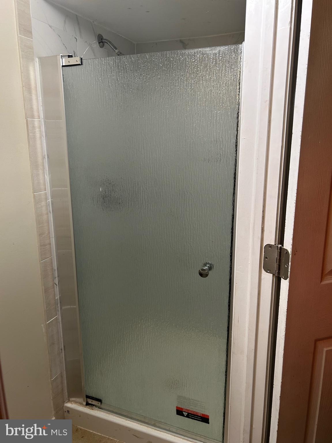 3216 Burleith Avenue Baltimore, MD 21215 - Photo 12 of 14 a bathroom with a shower