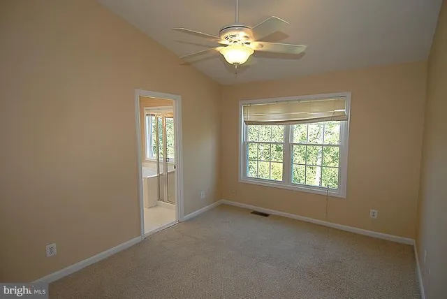 a view of empty room with a window
