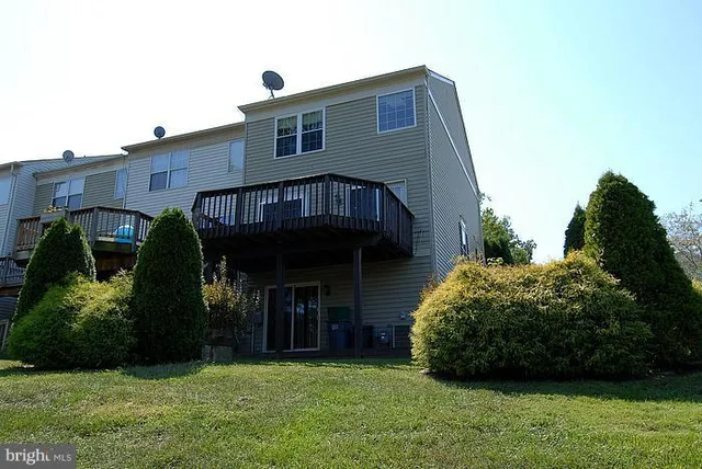 a view of a house with a garden