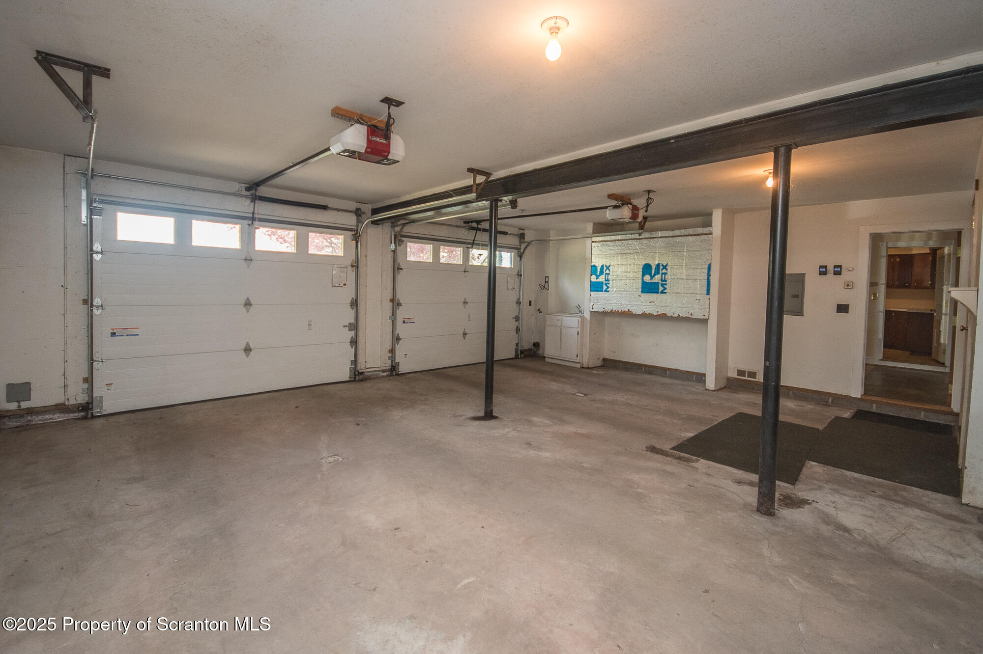 612 Clinton Street Waverly, PA 18471 - Photo 13 of 44 a view of a room with gym equipment