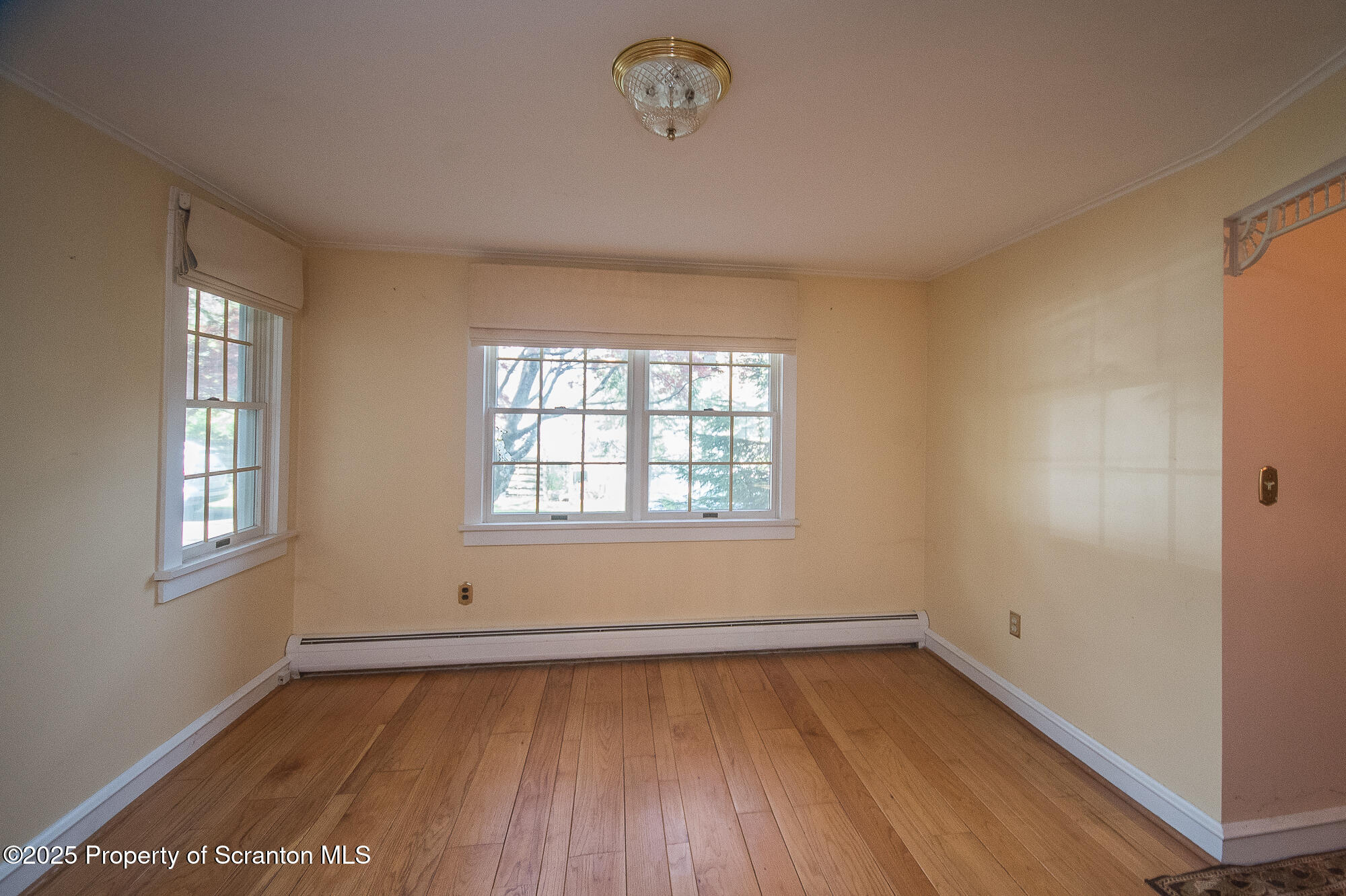 612 Clinton Street Waverly, PA 18471 - Photo 23 of 44 an empty room with a window