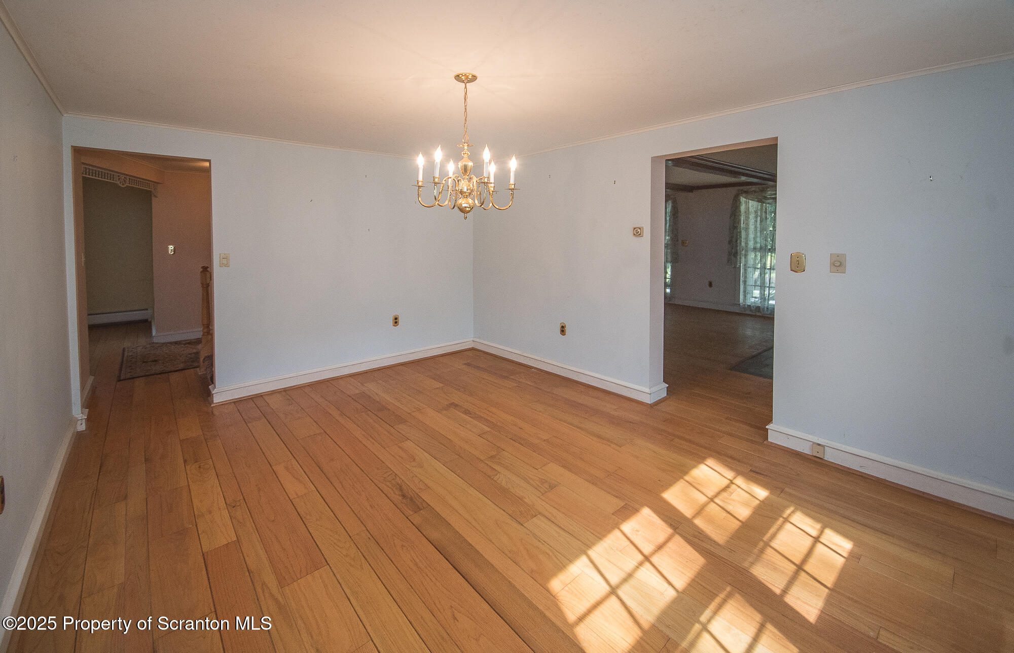 612 Clinton Street Waverly, PA 18471 - Photo 29 of 44 a view of empty room with wooden floor