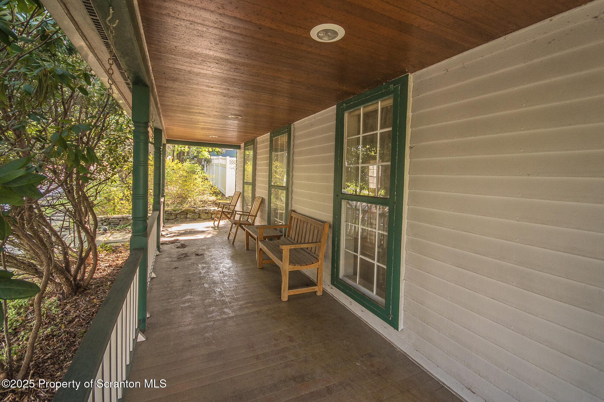 612 Clinton Street Waverly, PA 18471 - Photo 7 of 44 a view of an empty room with a balcony