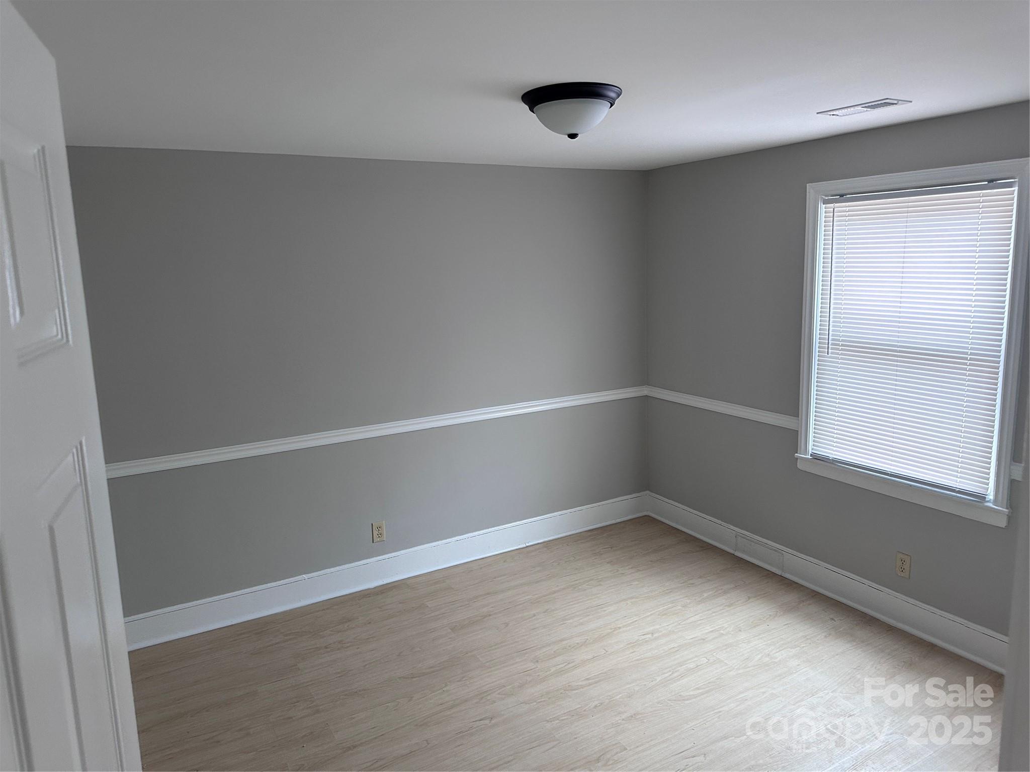 3113 Tuckaseegee Road Charlotte, NC 28208 - Photo 4 of 12 a view of an empty room with a window