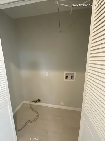 a bathroom with a sink mirror and a shower
