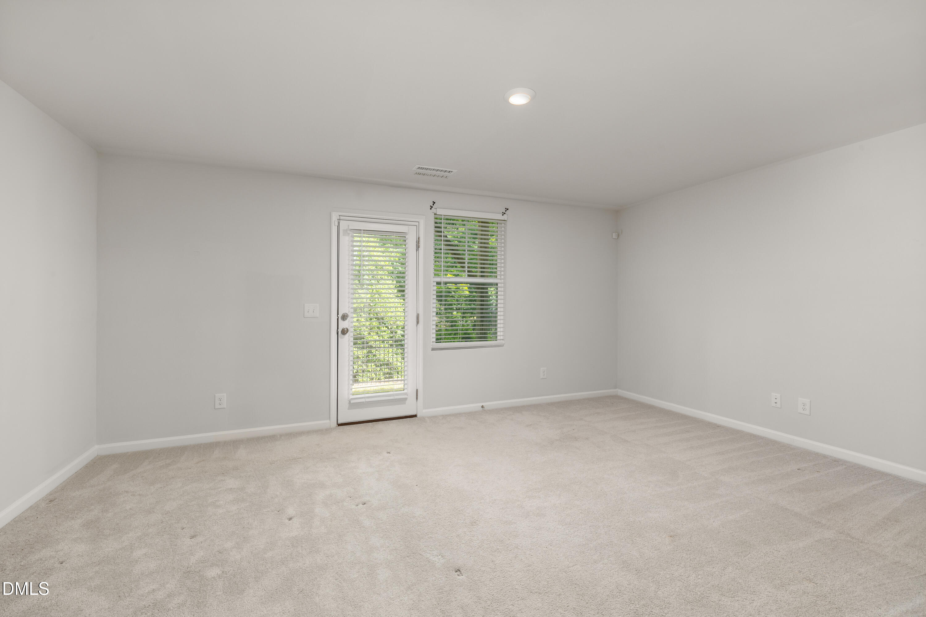 2524 Laurel Valley Way Raleigh, NC 27604 - Photo 7 of 12 an empty room with windows