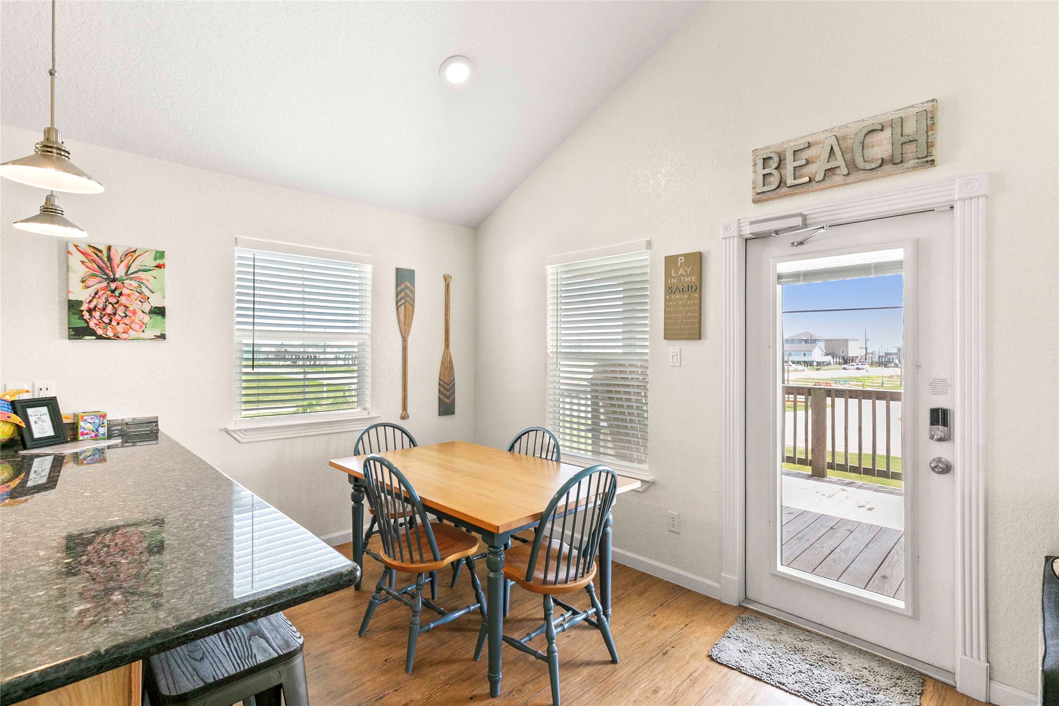 757 Bluewater Highway Surfside Beach, TX 77541 - Photo 14 of 44 a view of a dining room with furniture window and outside view