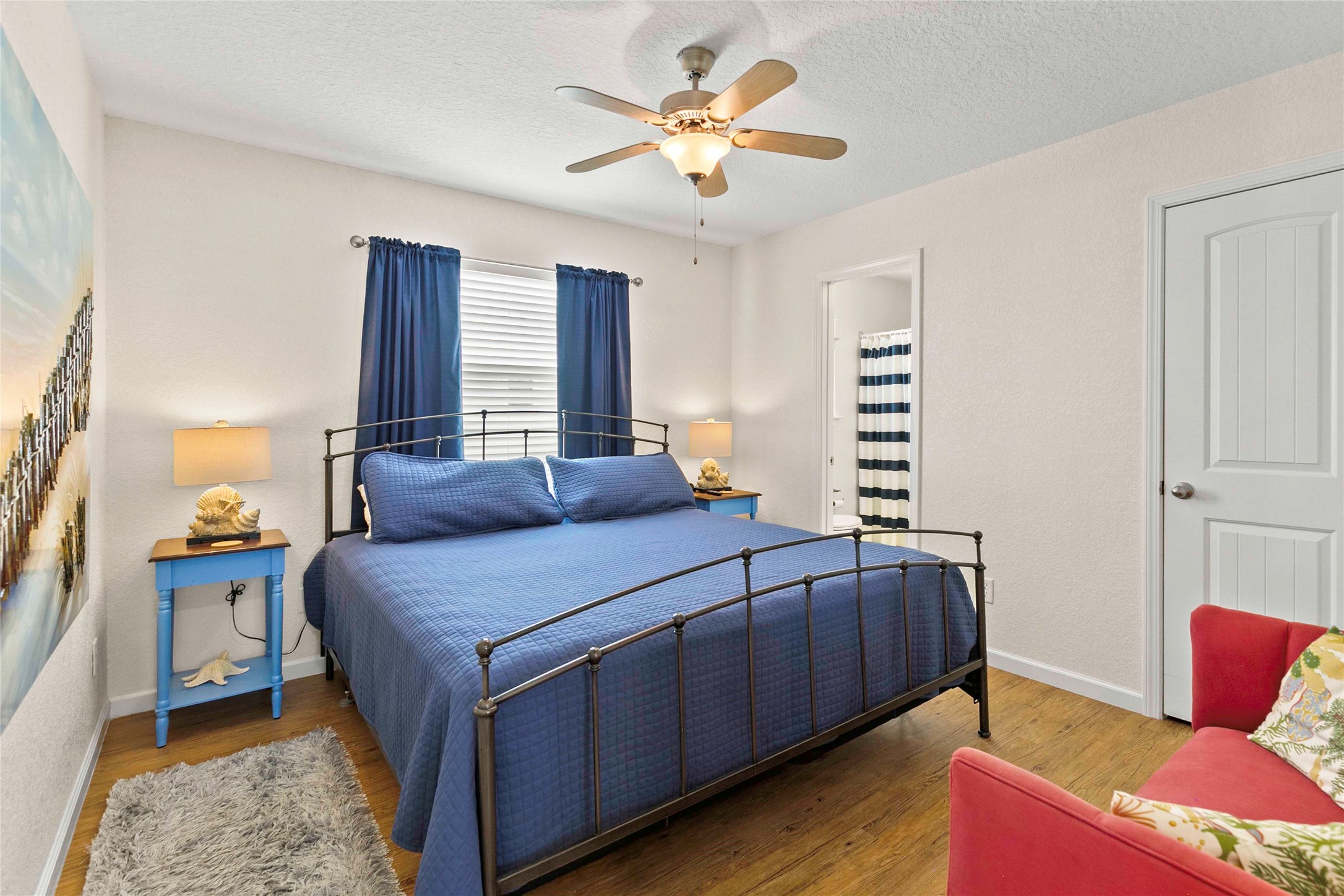 757 Bluewater Highway Surfside Beach, TX 77541 - Photo 19 of 44 a bed room with a bed and a couch