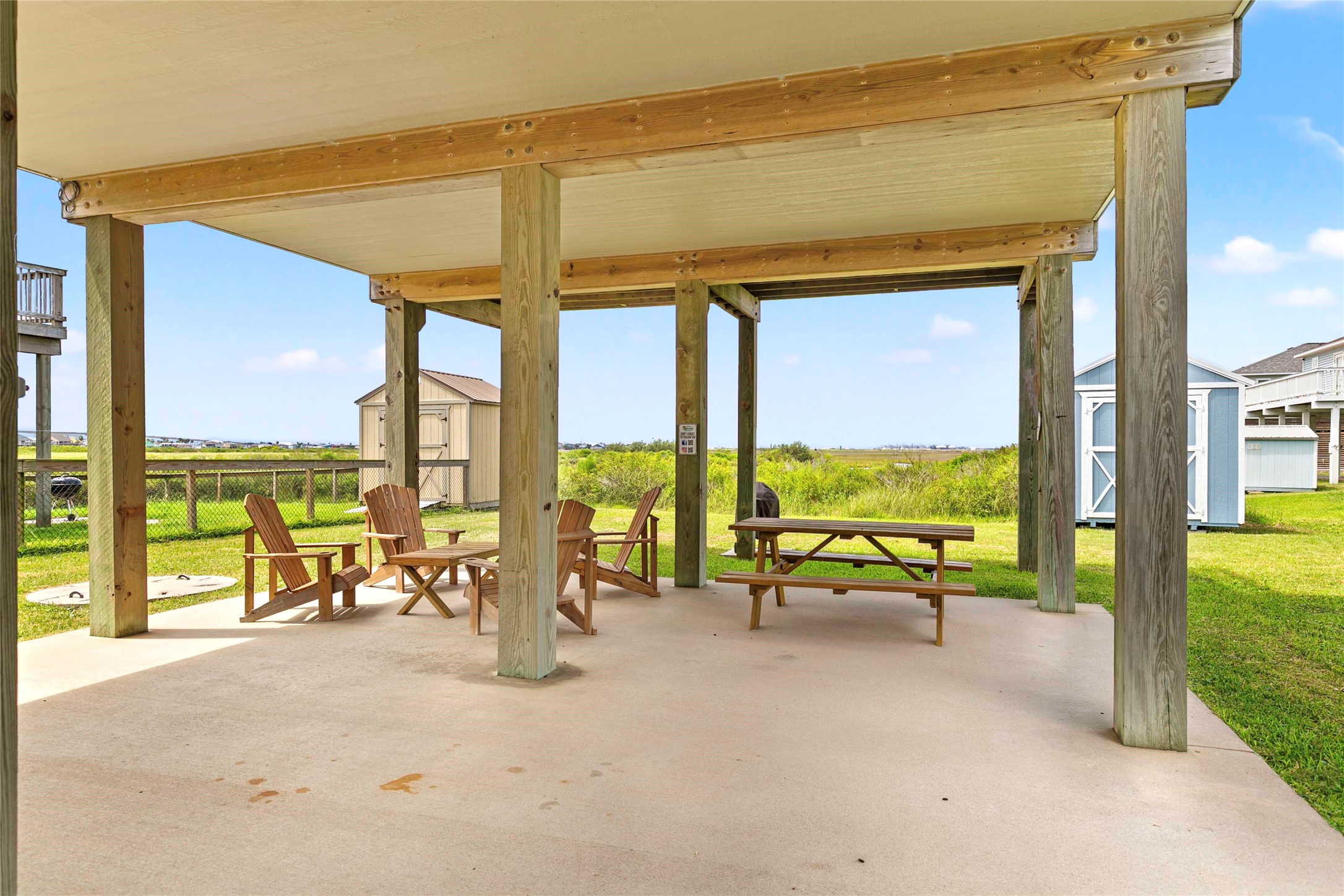 757 Bluewater Highway Surfside Beach, TX 77541 - Photo 30 of 44 a view of a swimming pool with outdoor seating