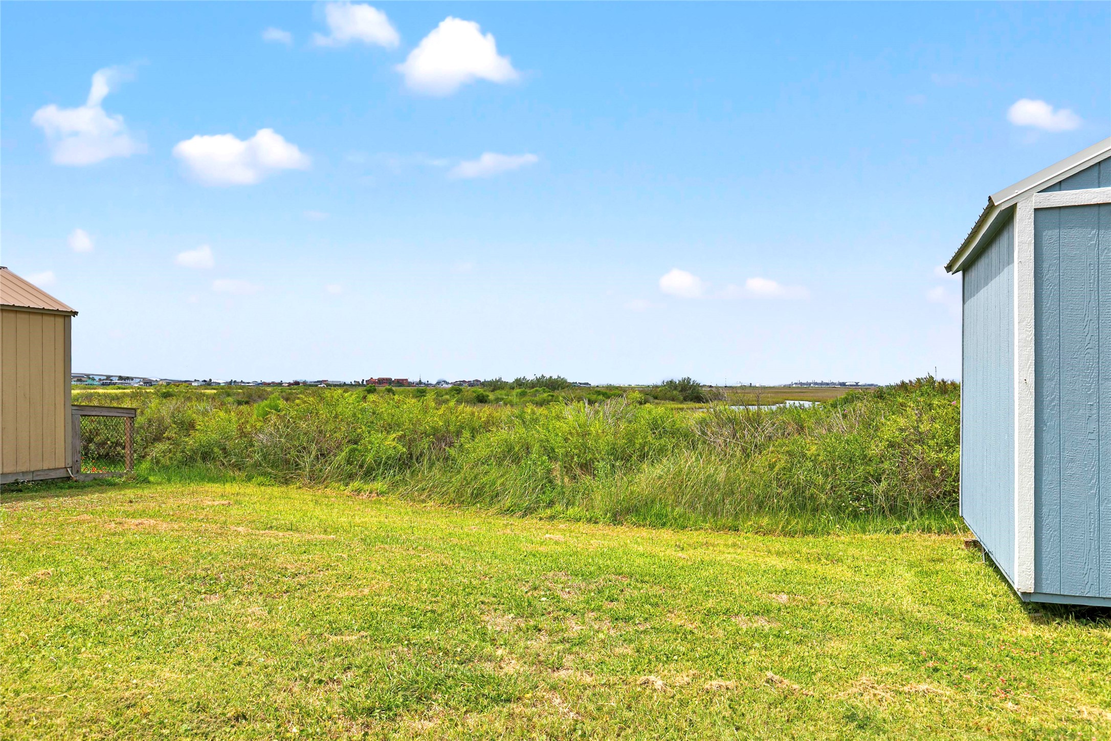 757 Bluewater Highway Surfside Beach, TX 77541 - Photo 34 of 44 a view of an ocean from a yard