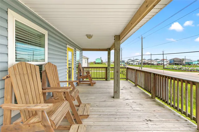 a balcony with furniture and city view