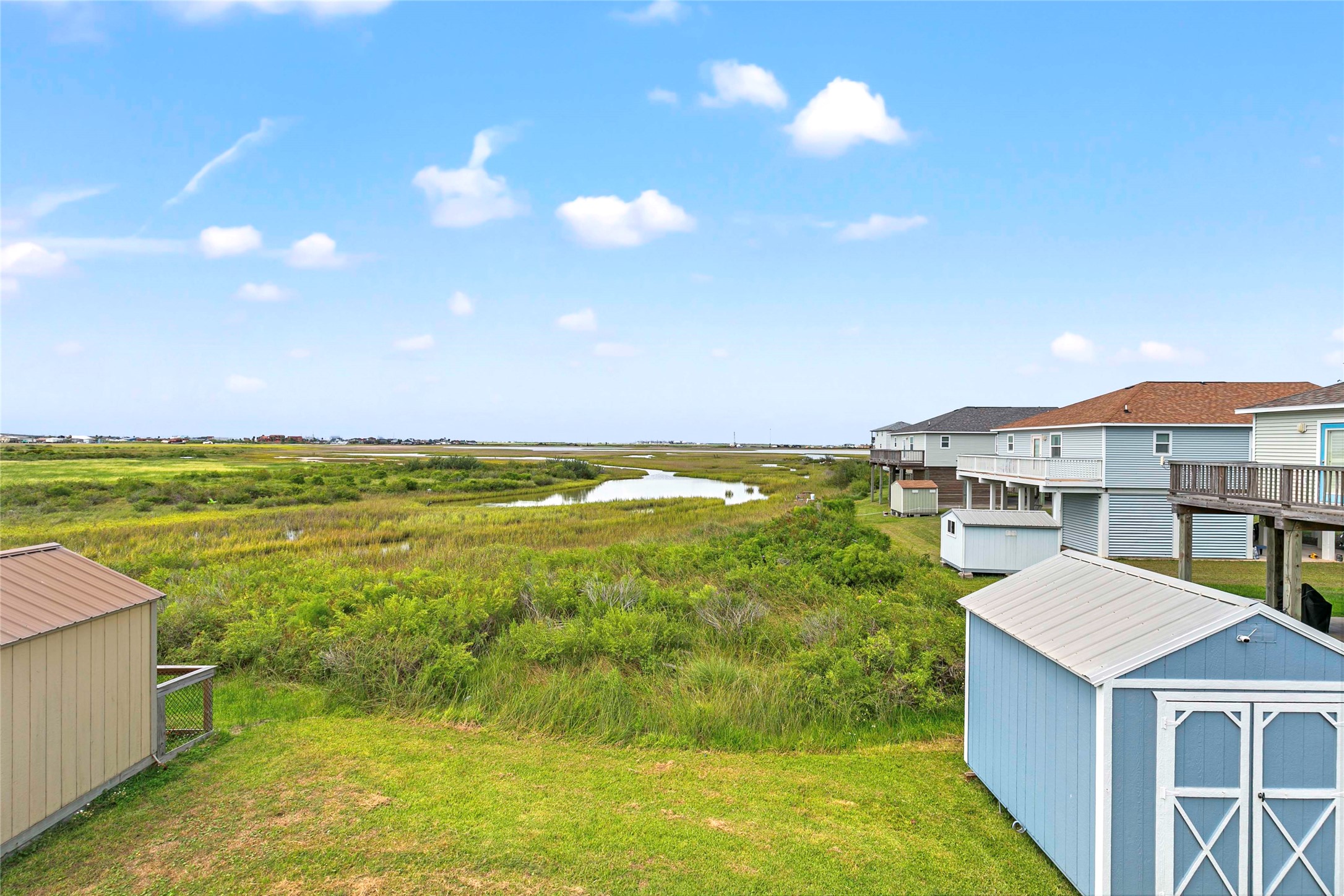 757 Bluewater Highway Surfside Beach, TX 77541 - Photo 8 of 44 a view of a city with tall buildings