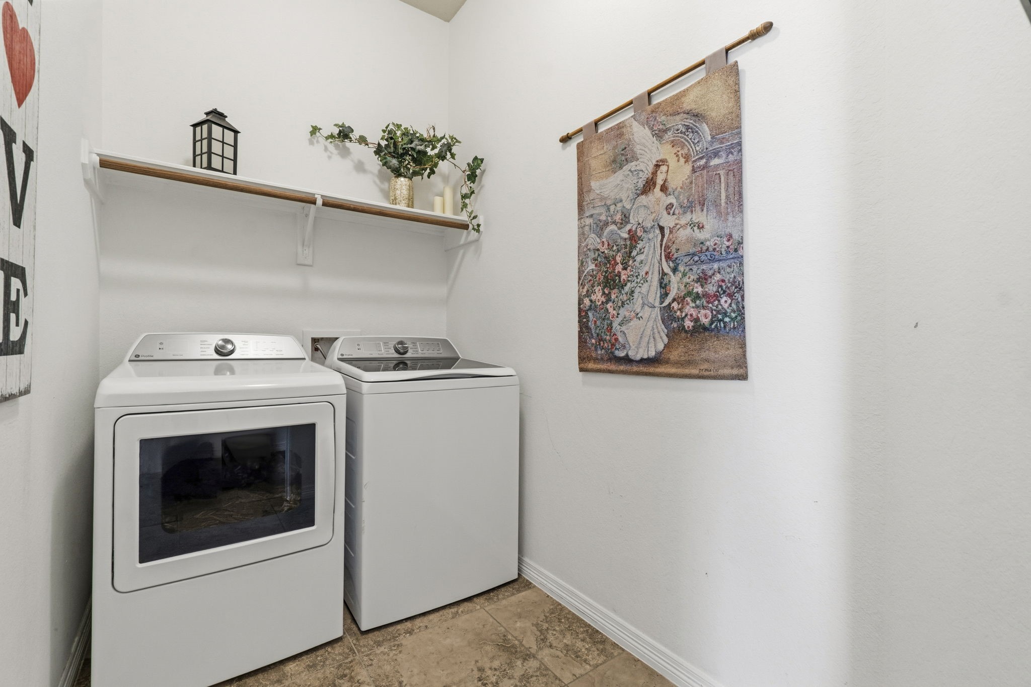 10802 Windswept Montgomery, TX 77356 - Photo 21 of 42 a utility room with dryer and washer