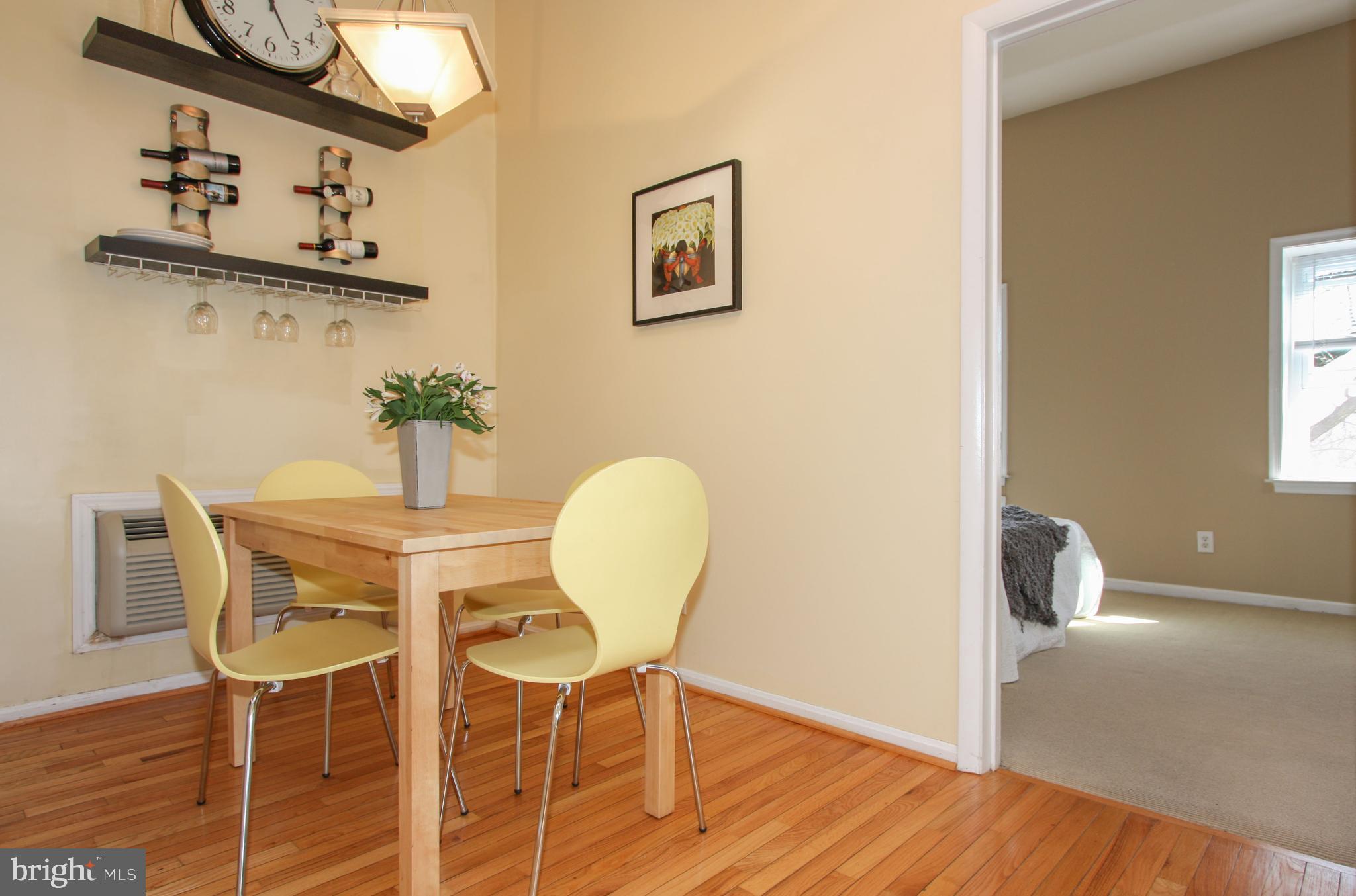 1434 Potomac Avenue Southeast, Unit 5 Washington, DC 20003 - Photo 11 of 38 a view of a dining room with furniture and wooden floor