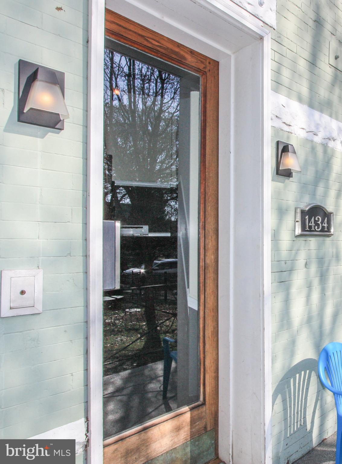 1434 Potomac Avenue Southeast, Unit 5 Washington, DC 20003 - Photo 32 of 38 a bathroom with a glass shower door