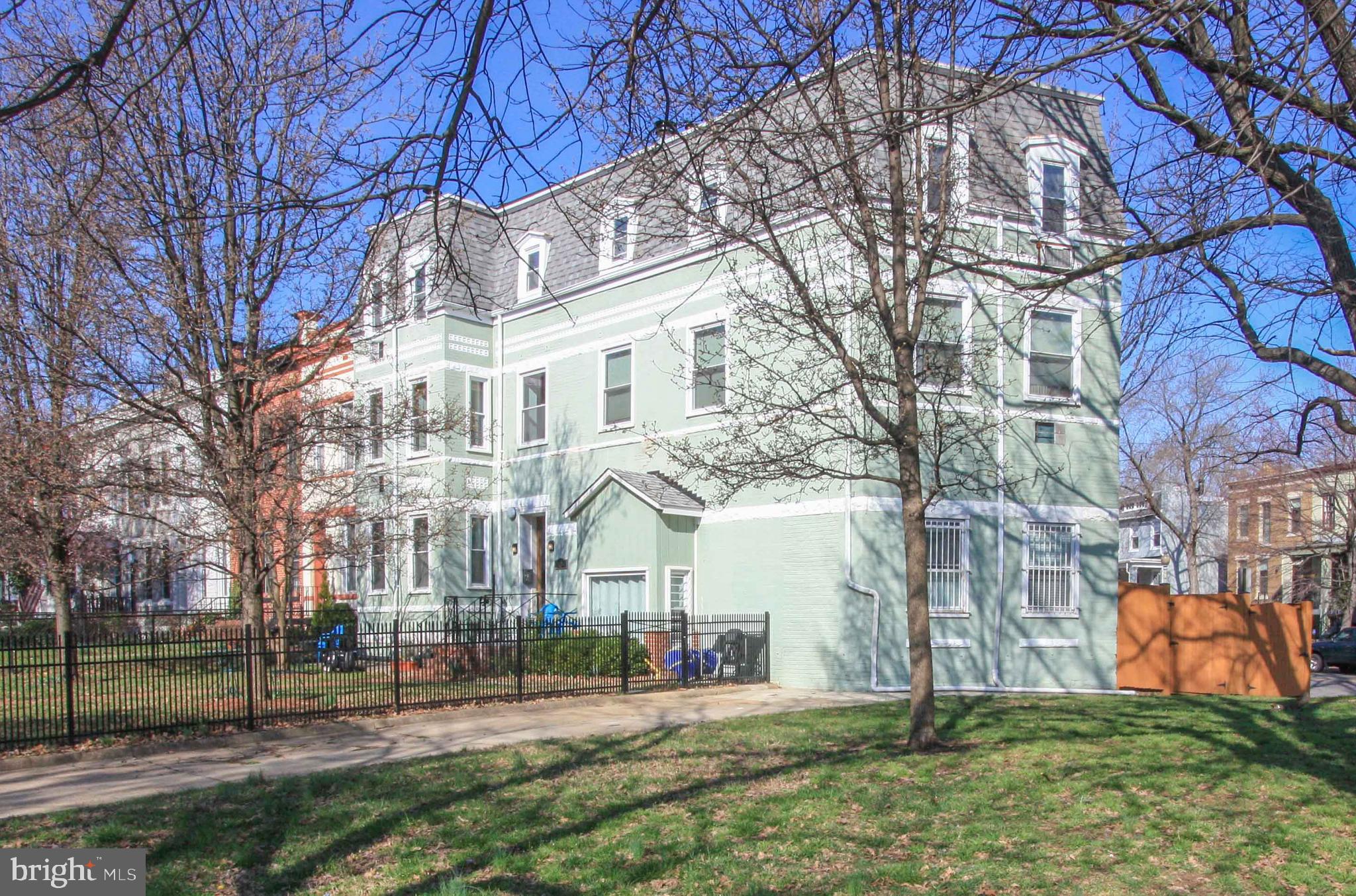 1434 Potomac Avenue Southeast, Unit 5 Washington, DC 20003 - Photo 35 of 38 a view of a building with a yard