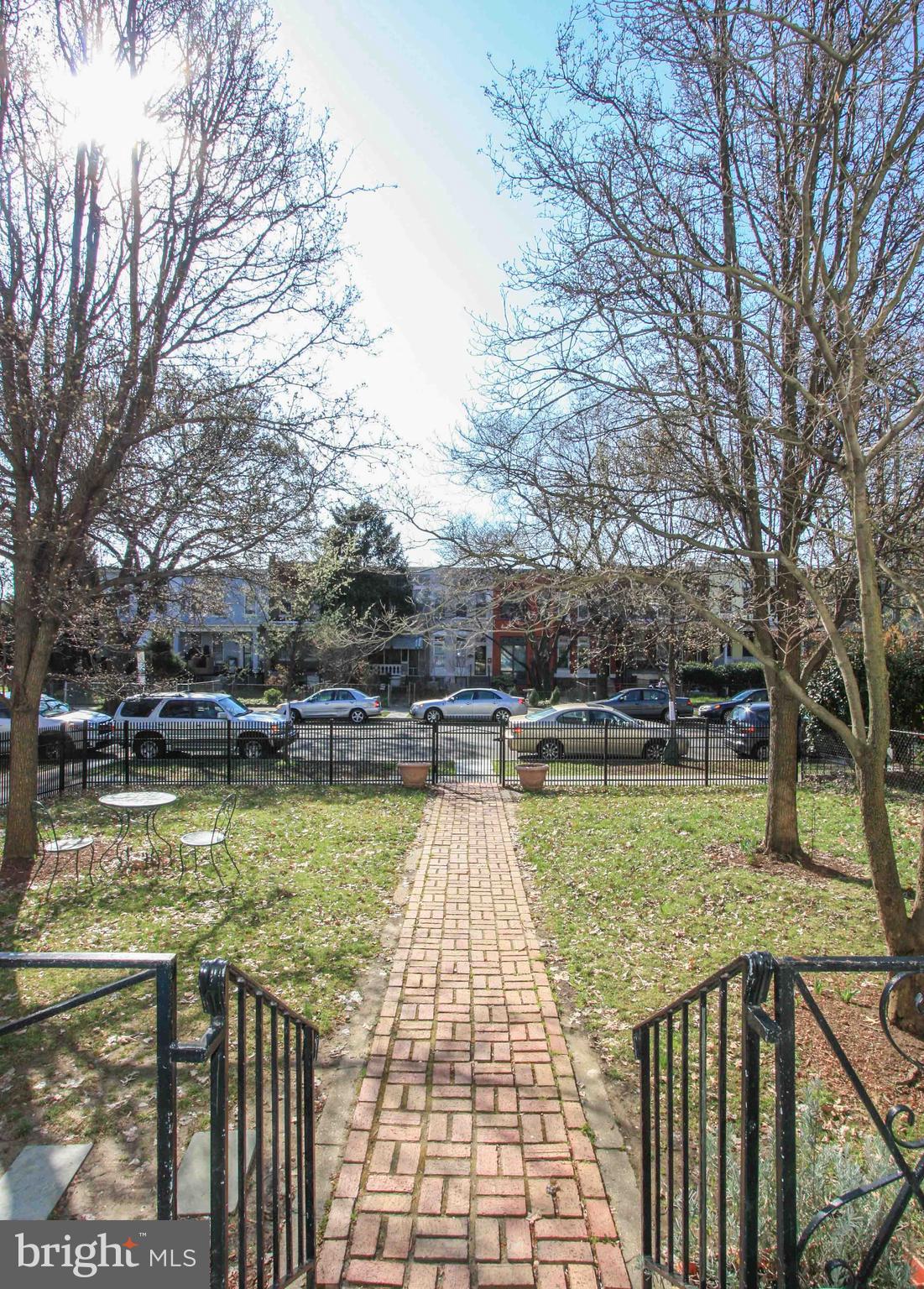 1434 Potomac Avenue Southeast, Unit 5 Washington, DC 20003 - Photo 38 of 38 a view of swimming pool with outdoor seating and lake