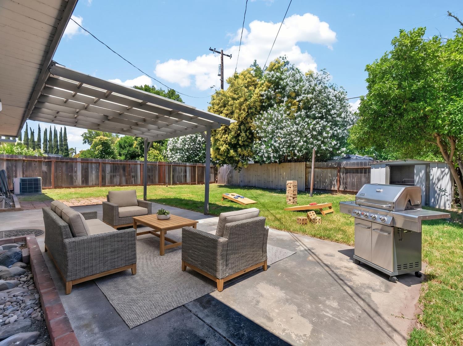1921 Calhoun Way Stockton, CA 95207 - Photo 26 of 35 Digital added outdoor items adds to the living space.