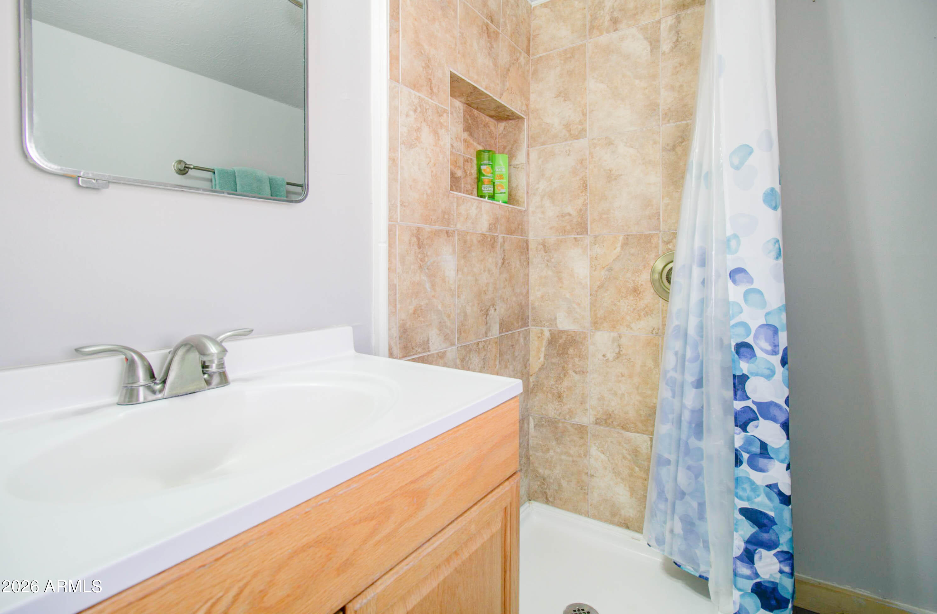 877 East Sycamore Street Globe, AZ 85501 - Photo 28 of 42 a bathroom with a sink and a mirror
