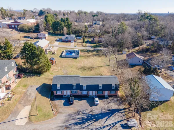 an aerial view of a city with lots of residential buildings