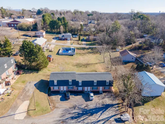 an aerial view of a city with lots of residential buildings