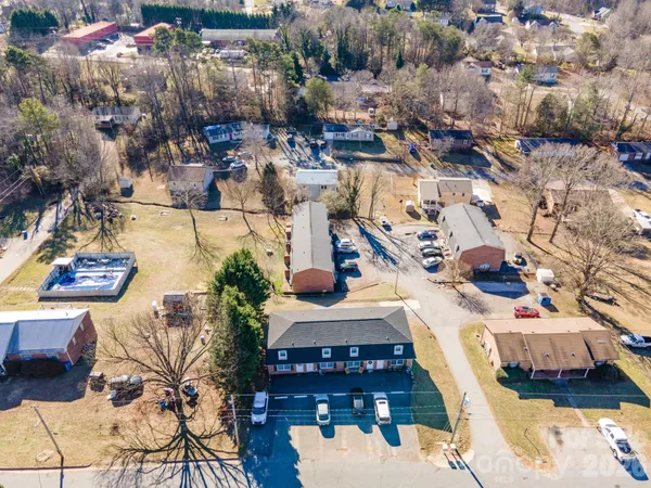 a kitchen with stainless steel appliances a sink a stove a refrigerator and cabinets