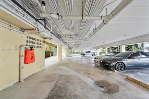 a view of parking garage with furniture