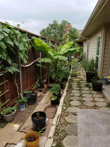 a backyard of a house with lots of green space