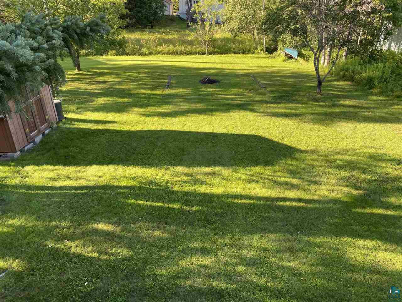 2713 Morris Thomas Road Duluth, MN 55811 - Photo 3 of 27 Back Yard has a little buffer area between neighboring yards