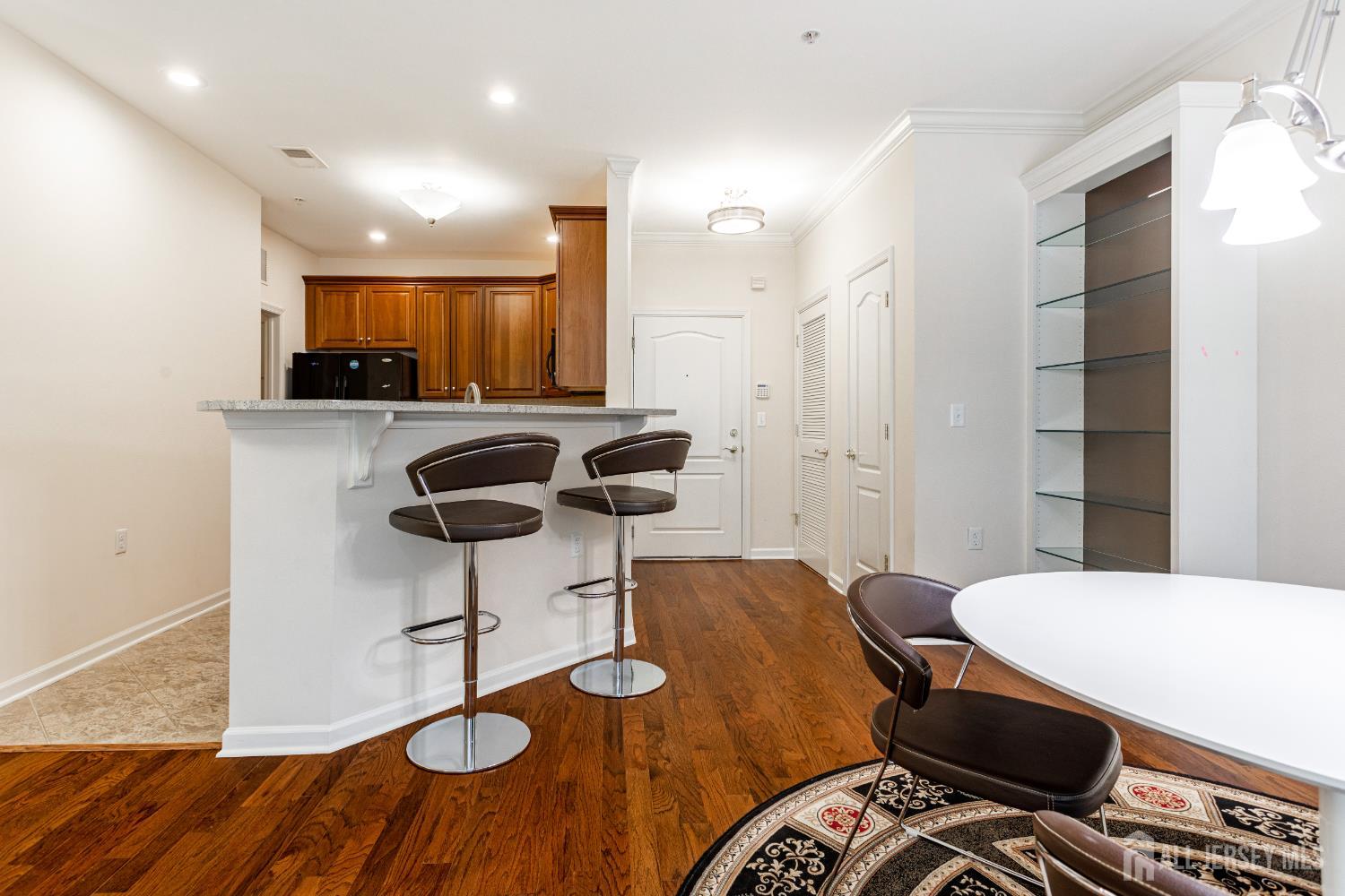 40 Azalea Drive Old Bridge, NJ 08857 - Photo 14 of 35 a kitchen with a table and chairs