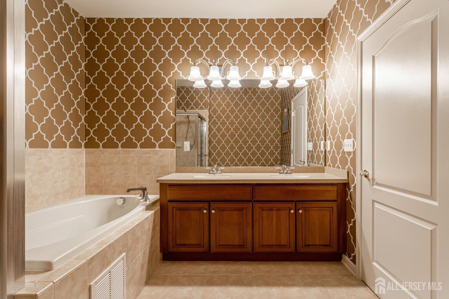 40 Azalea Drive Old Bridge, NJ 08857 - Photo 18 of 35 a bathroom with a sink and a bathtub