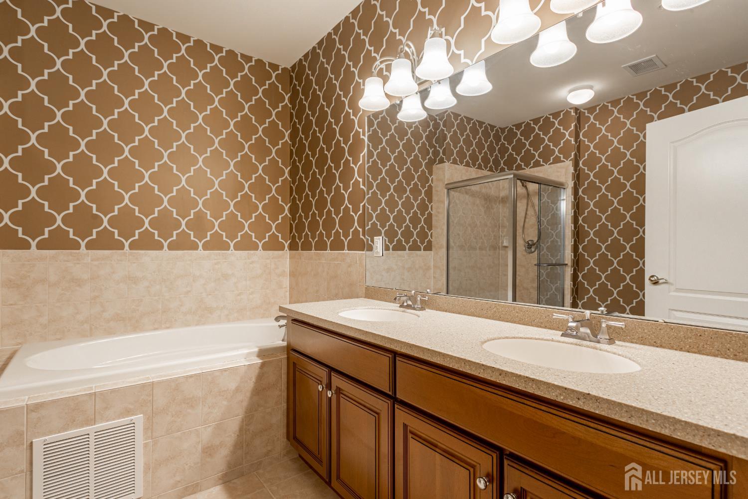 40 Azalea Drive Old Bridge, NJ 08857 - Photo 19 of 35 a bathroom with a sink and a mirror