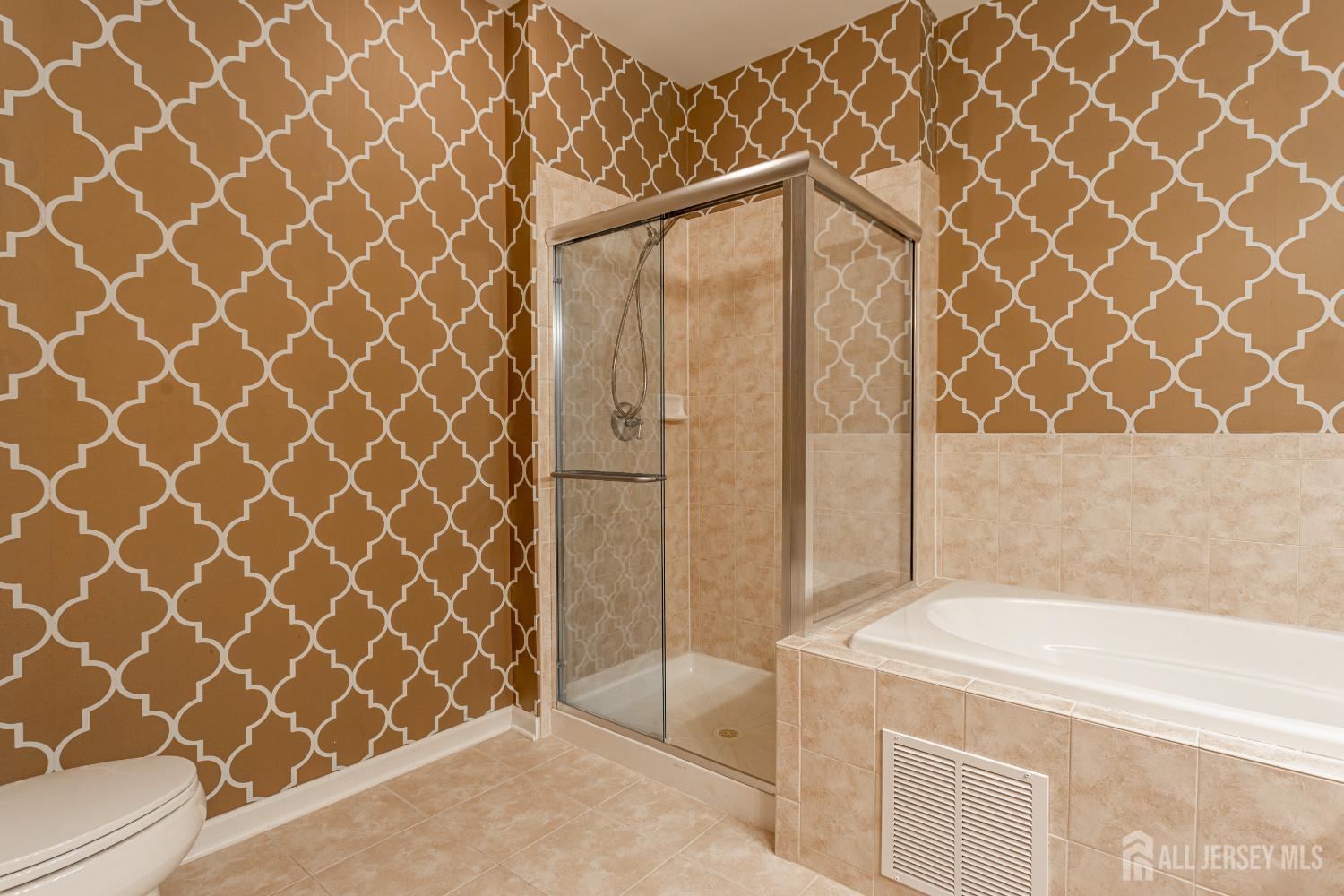 40 Azalea Drive Old Bridge, NJ 08857 - Photo 21 of 35 a bathroom with a bathtub and shower