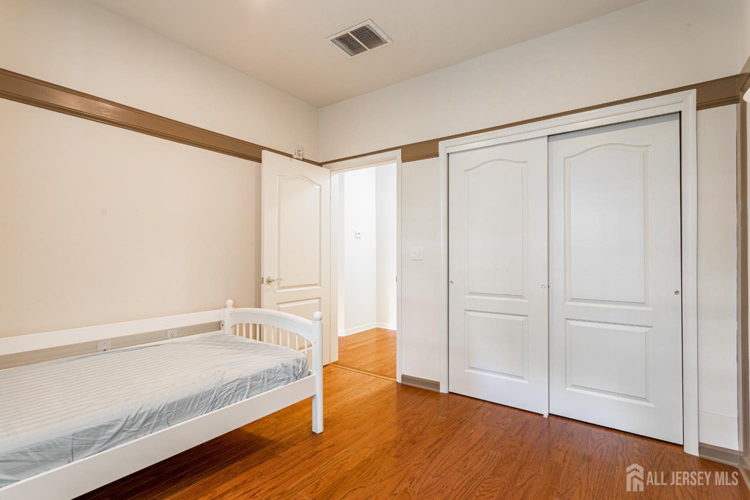 40 Azalea Drive Old Bridge, NJ 08857 - Photo 24 of 35 a spacious bedroom with a bed and a shower