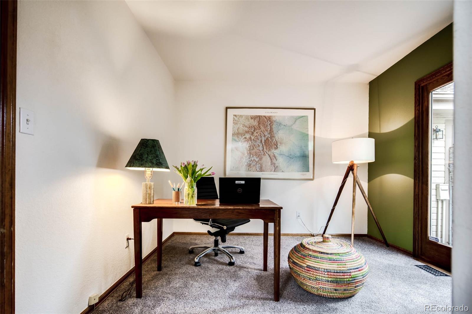 6549 Poppy Street Arvada, CO 80007 - Photo 12 of 33 a view of a workspace with furniture