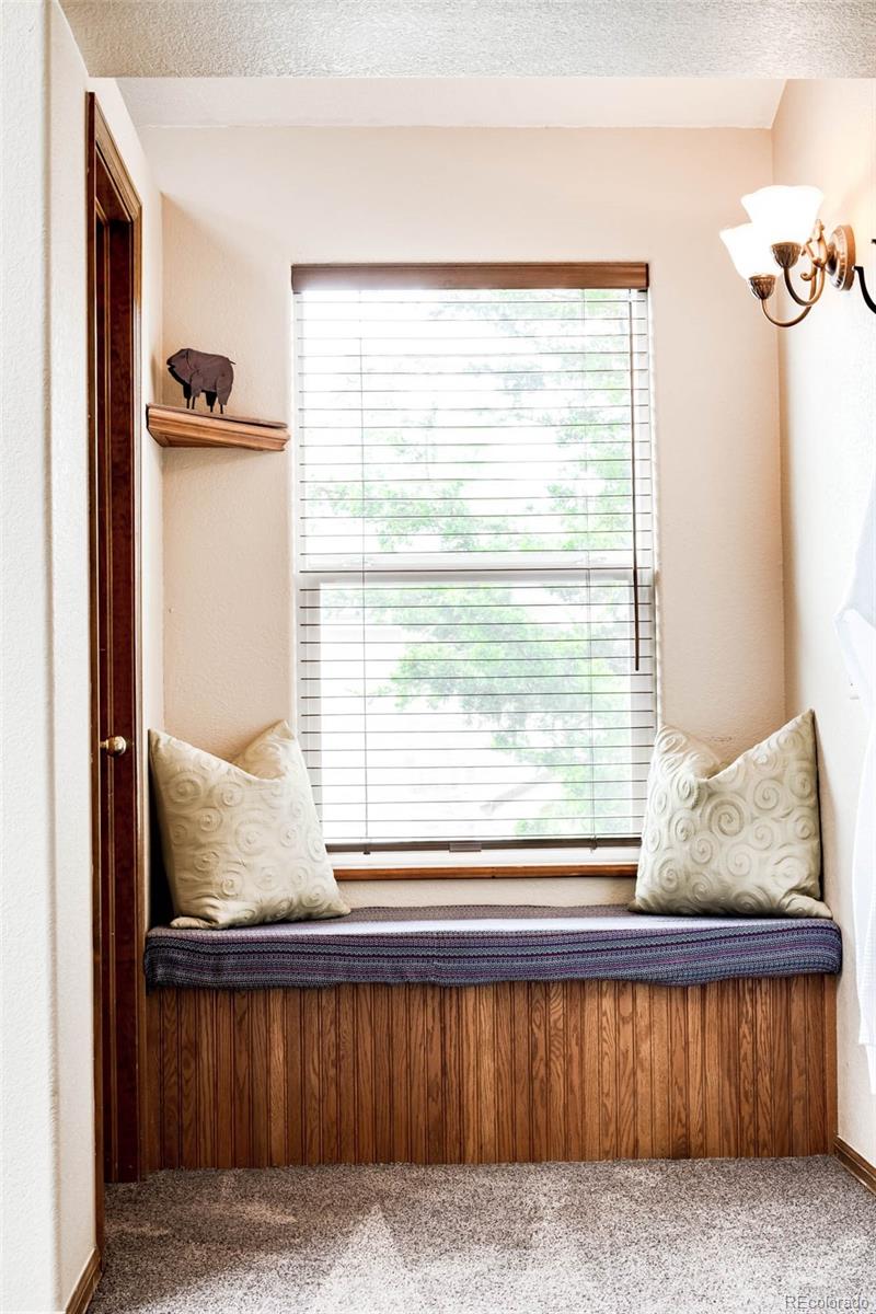 6549 Poppy Street Arvada, CO 80007 - Photo 18 of 33 a living room with a large window