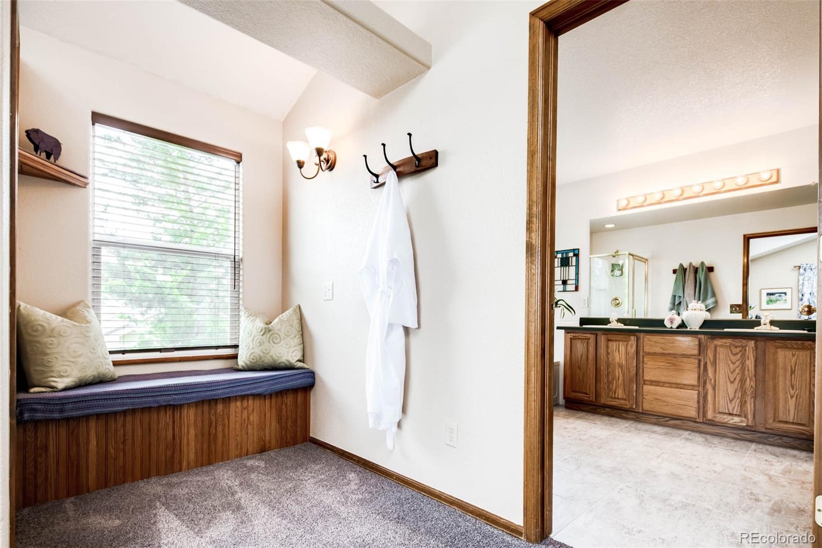 6549 Poppy Street Arvada, CO 80007 - Photo 19 of 33 a view of kitchen with furniture and large window