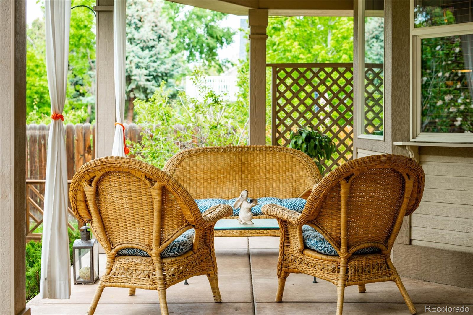 6549 Poppy Street Arvada, CO 80007 - Photo 29 of 33 a view of a dining room with furniture and a window
