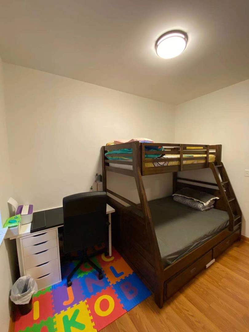 723 West 31st Street, Unit 2 Chicago, IL 60616 - Photo 13 of 21 a bedroom with furniture and a wooden floor