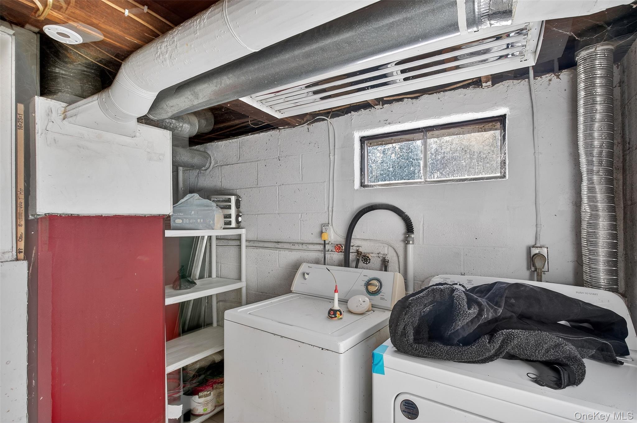 488 Tally Ho Road Middletown, NY 10940 - Photo 12 of 16 a kitchen with a stove and a cabinet