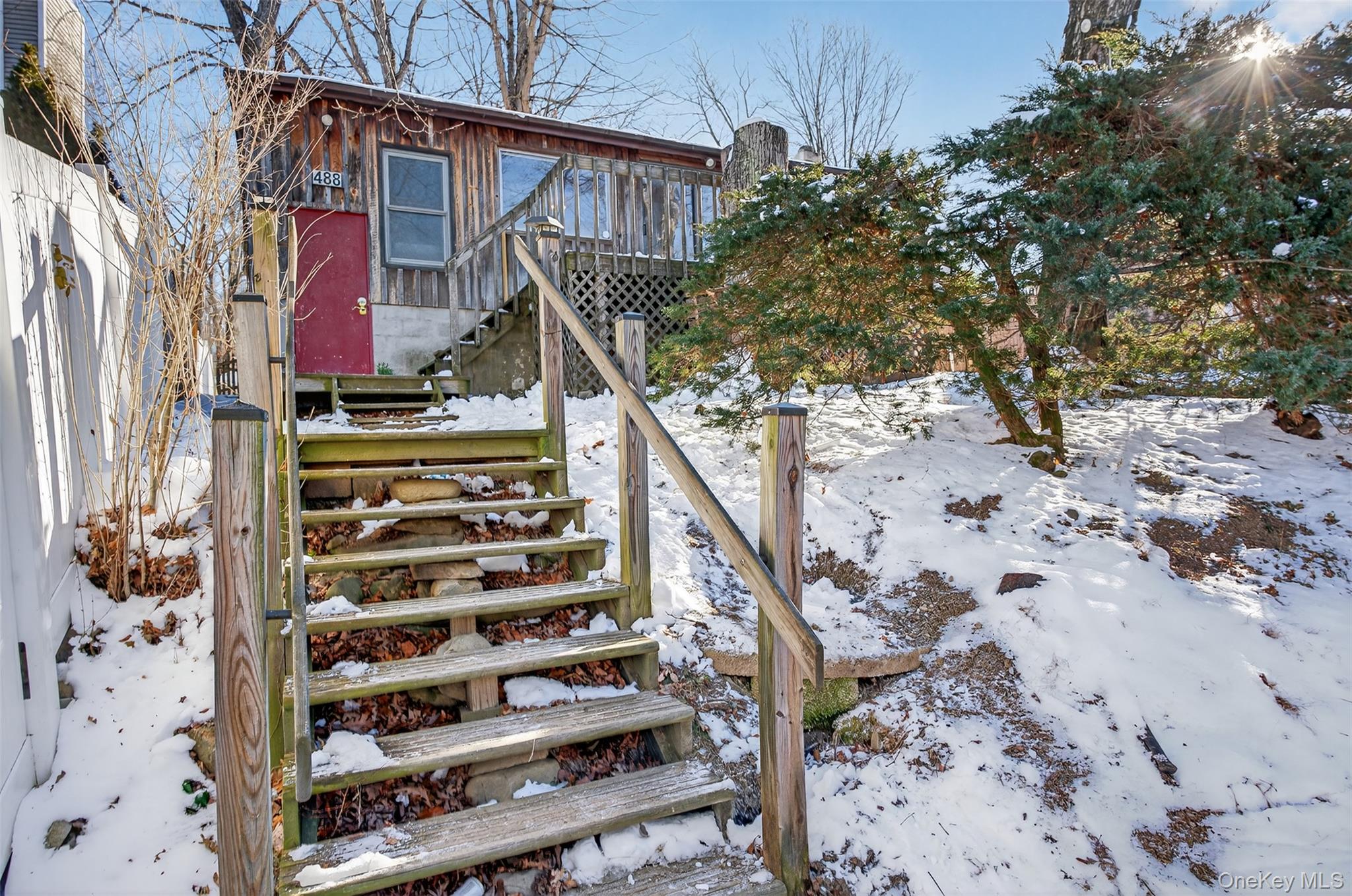 488 Tally Ho Road Middletown, NY 10940 - Photo 4 of 16 front view of a house with a trees