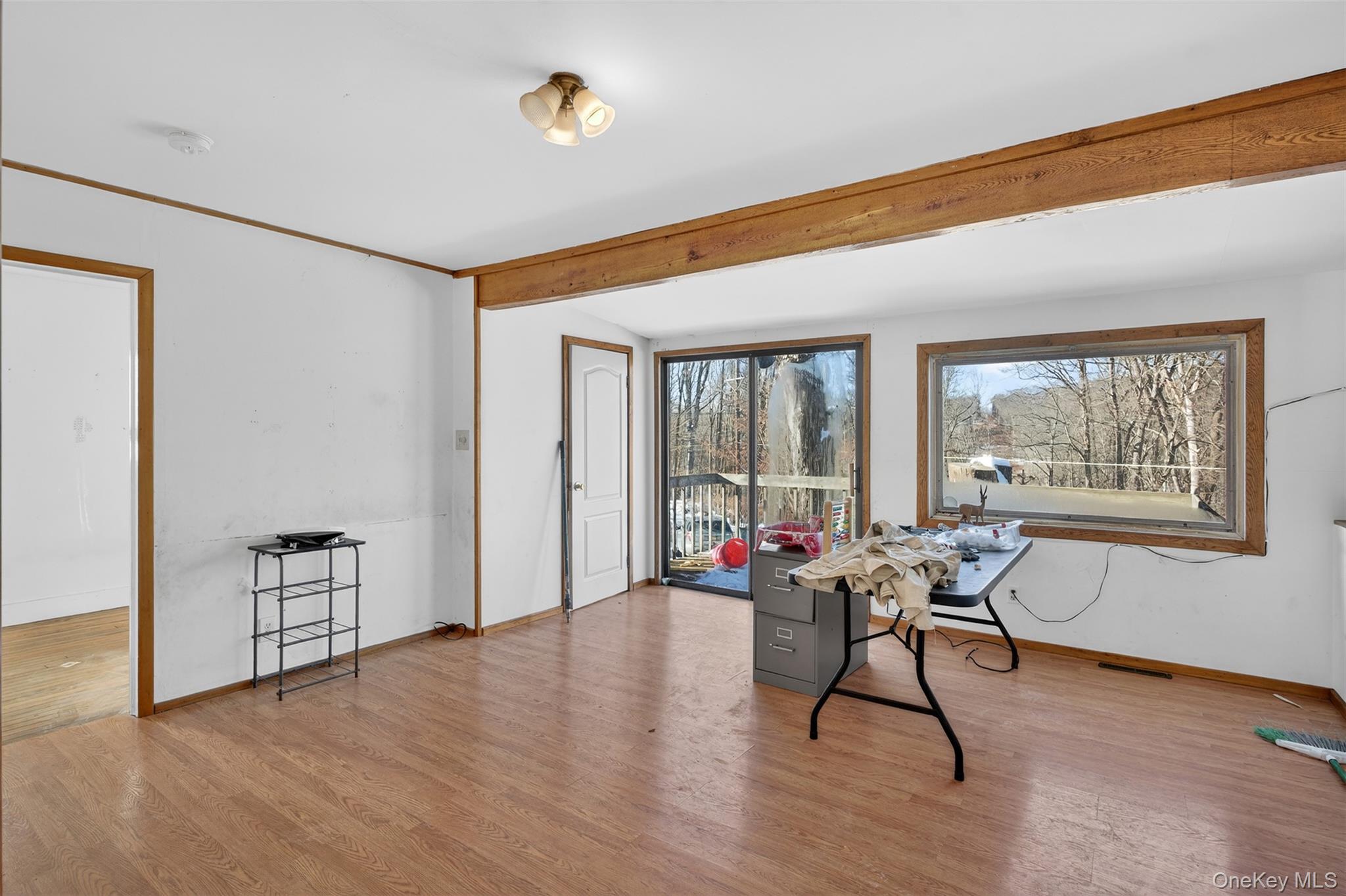 488 Tally Ho Road Middletown, NY 10940 - Photo 6 of 16 a living room with furniture and a large window