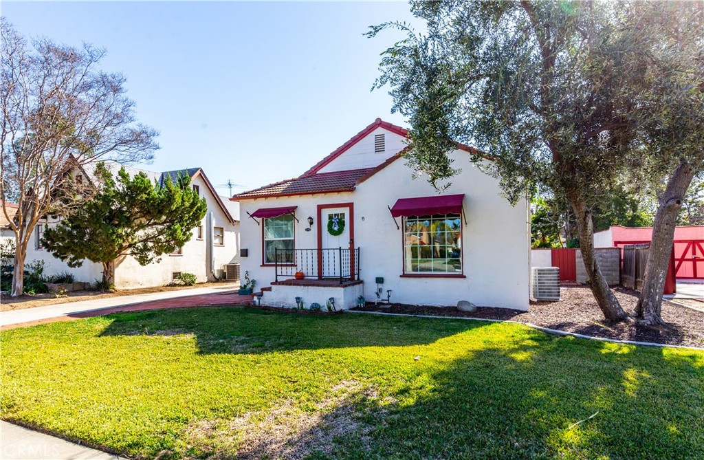 4290 Merrill Avenue Riverside, CA 92506 - Photo 1 of 1 a view of a house with swimming pool and sitting area