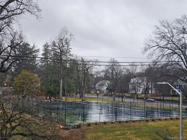 a view of a lake with a yard
