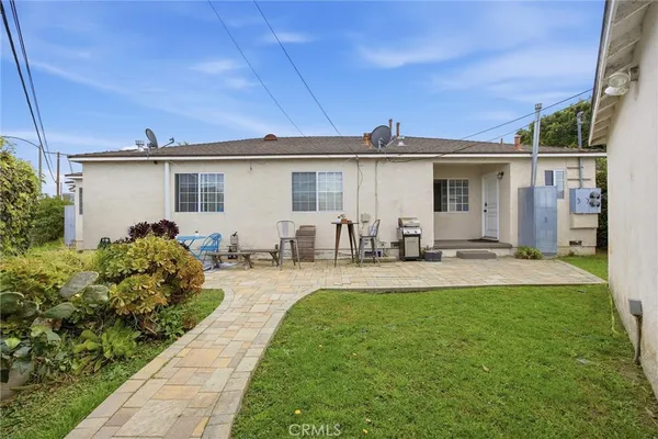 a front view of a house with patio