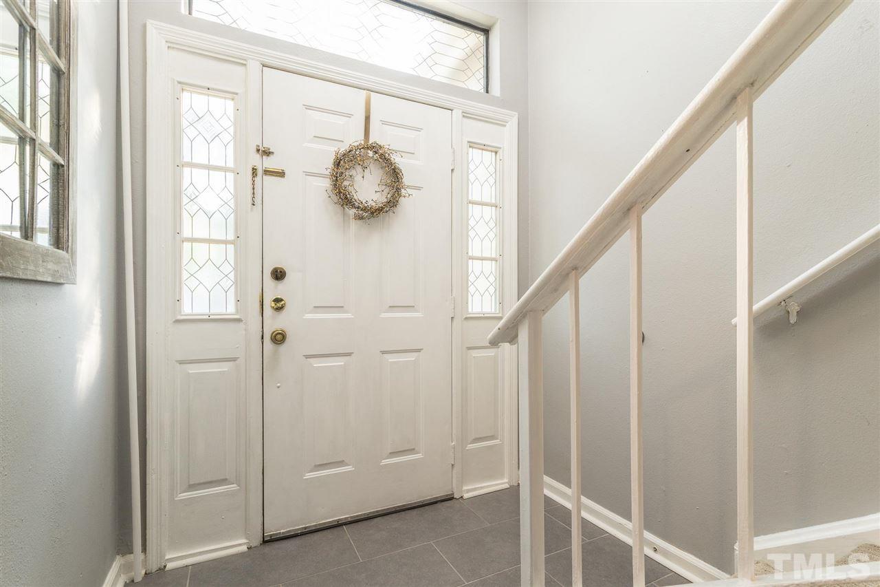 7615 Falcon Rest Circle, Unit 7615 Raleigh, NC 27615 - Photo 9 of 26 a view of an entryway with wooden floor