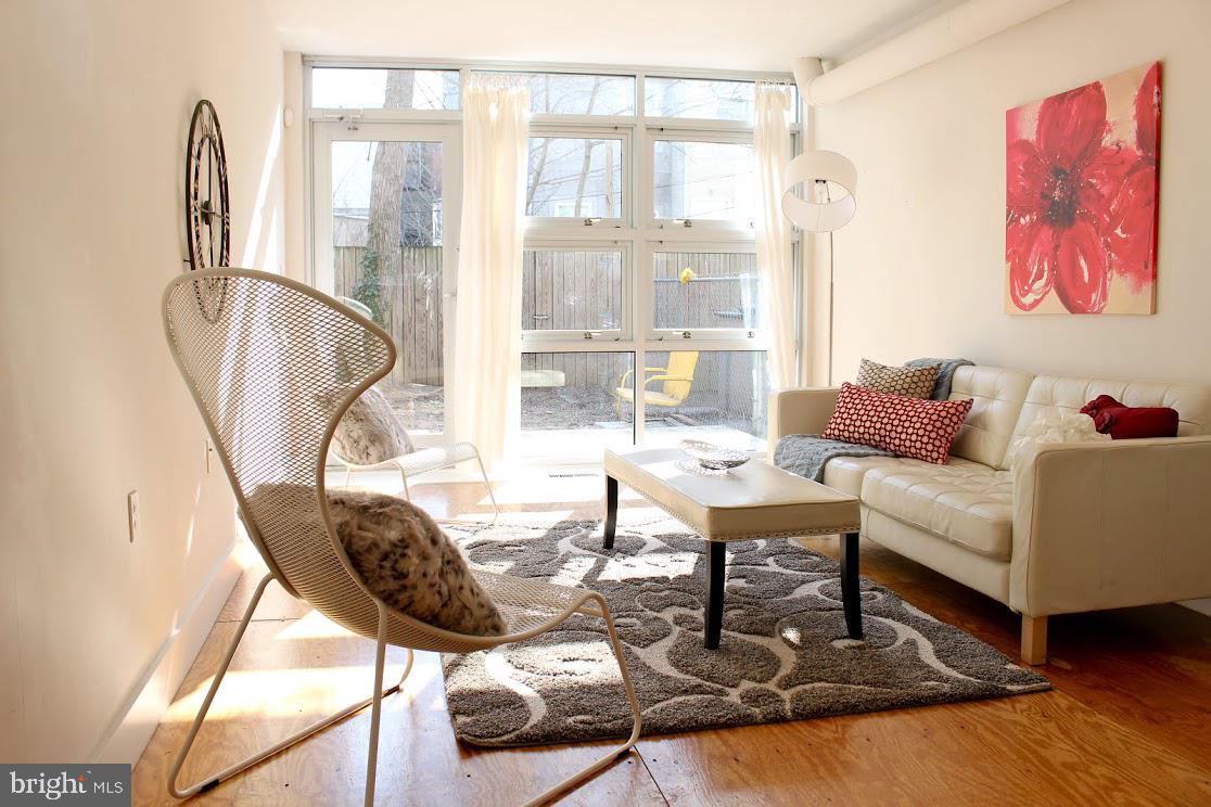 523 Budd Street Philadelphia, PA 19104 - Photo 13 of 48 a living room with furniture and a large window