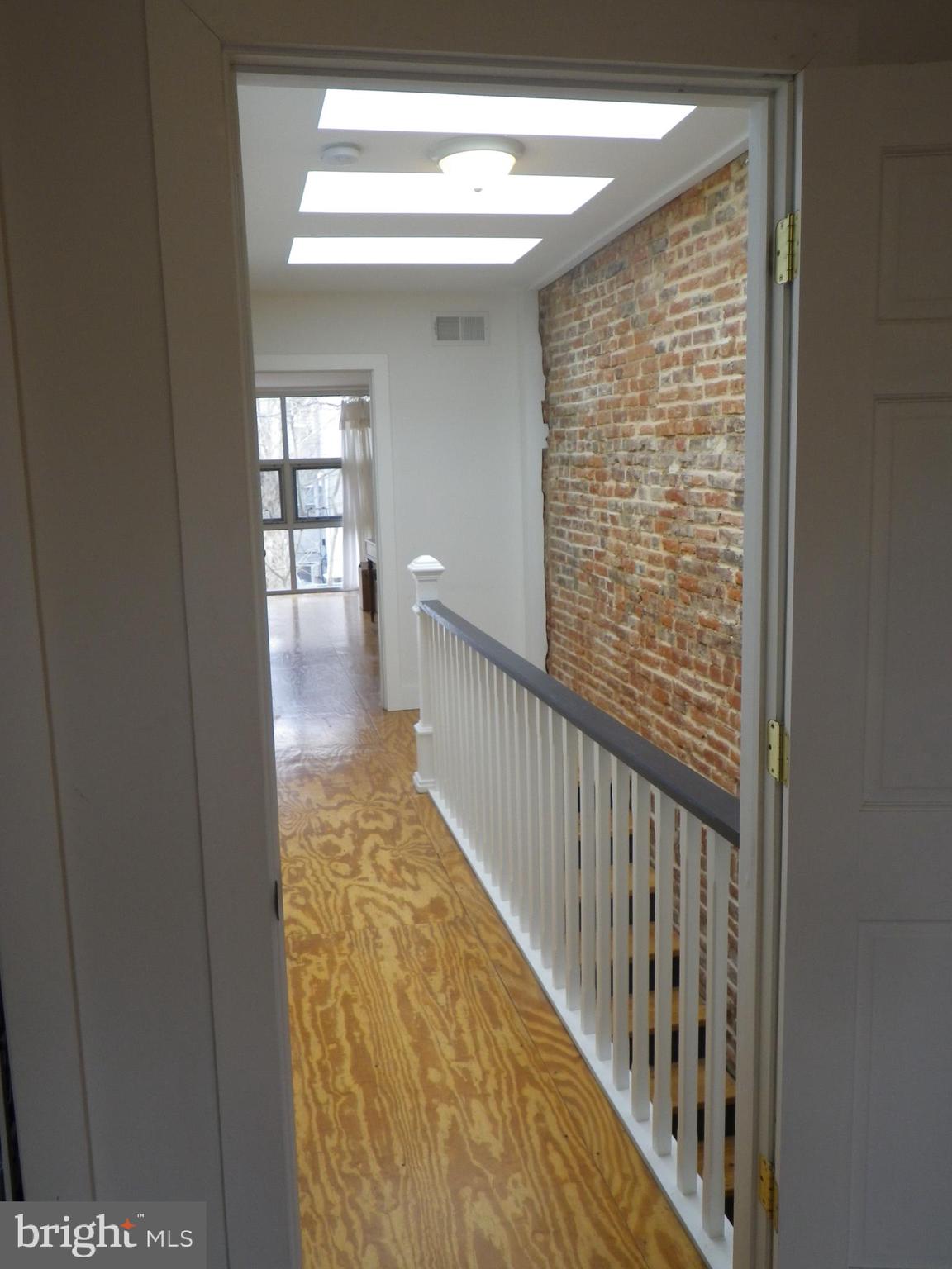 523 Budd Street Philadelphia, PA 19104 - Photo 26 of 48 a view of a hallway with windows