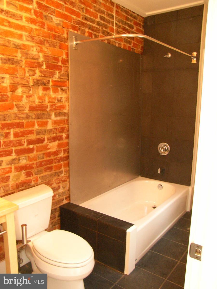 523 Budd Street Philadelphia, PA 19104 - Photo 31 of 48 a bathroom with a sink and toilet